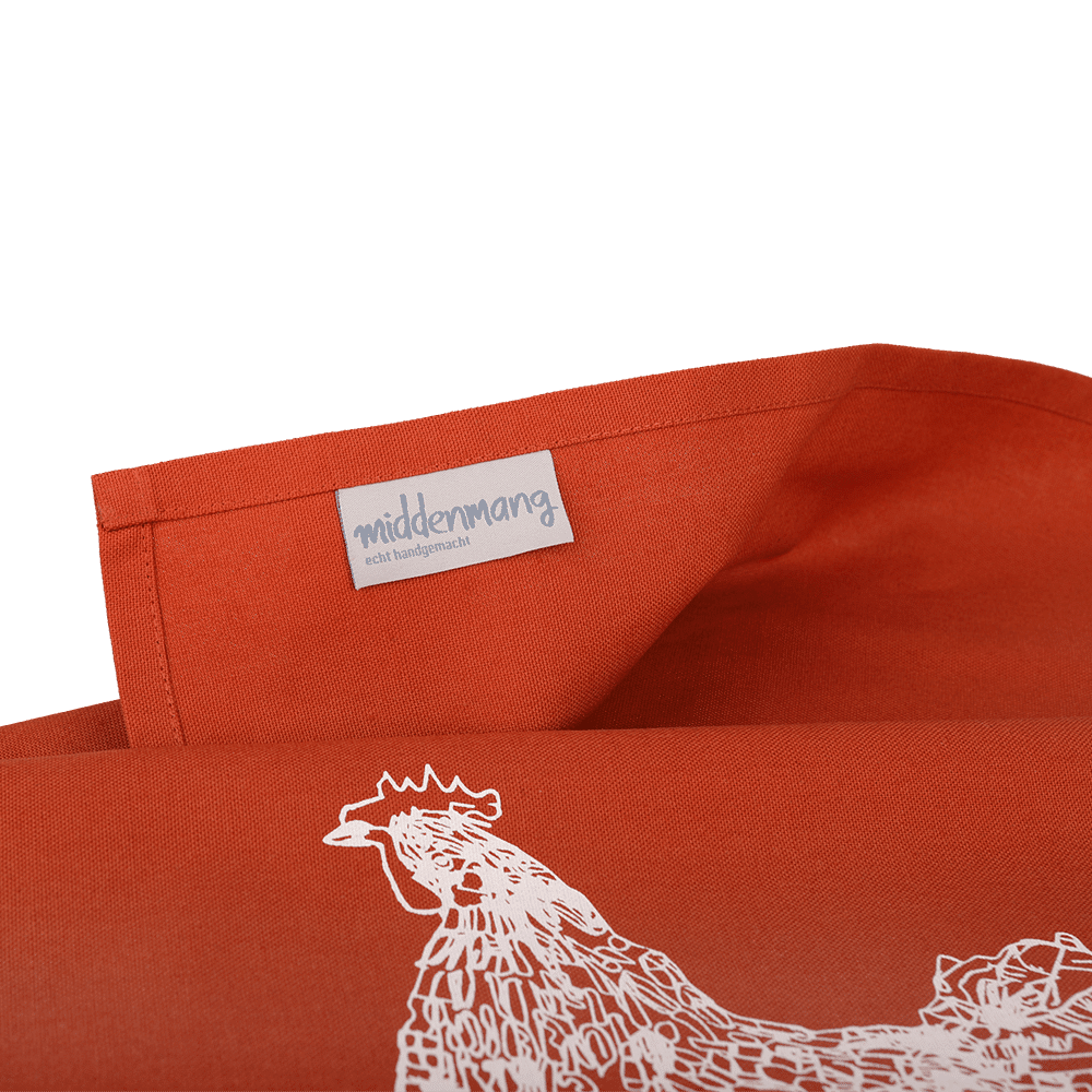 Ein Schild mit Logo eines Geschirrtuchs in der Farbe rost-orange, bedruckt mit einem Huhn.