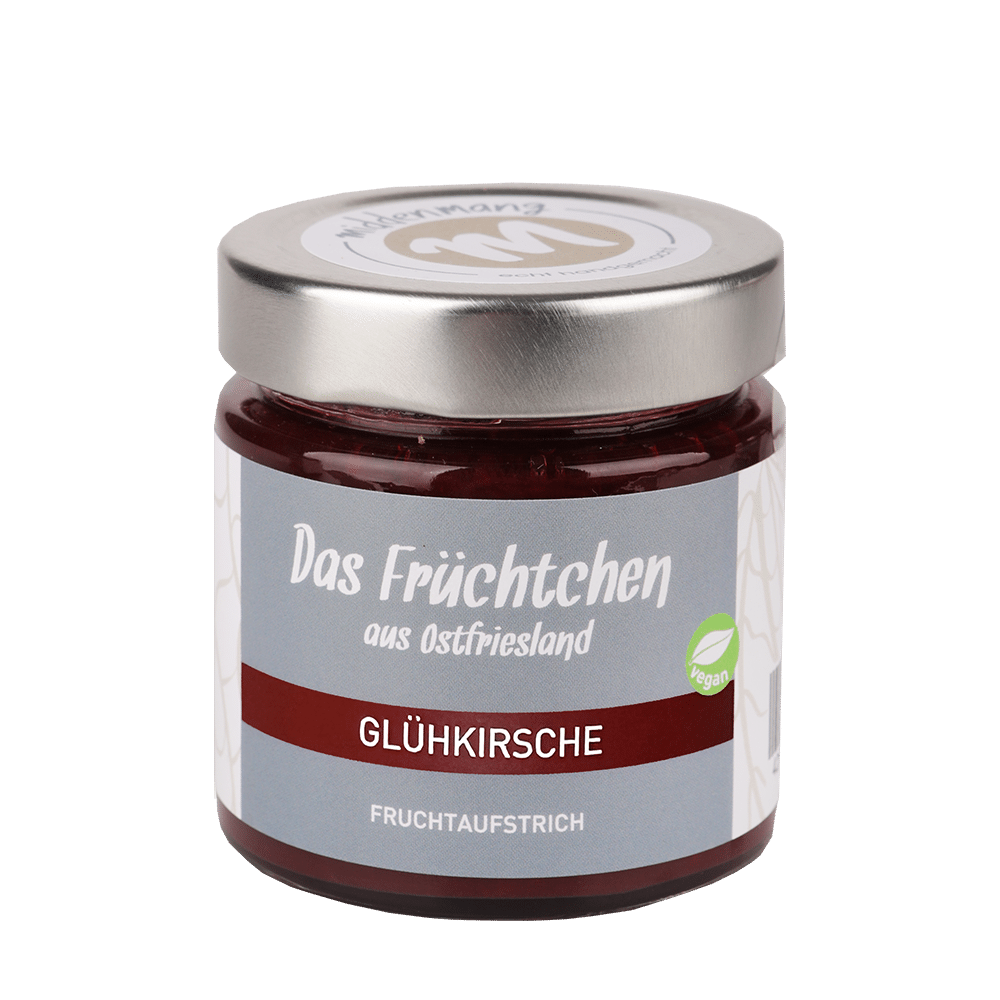 Ein Glas Fruchtaufstrich der Sorte Glühkirsche.