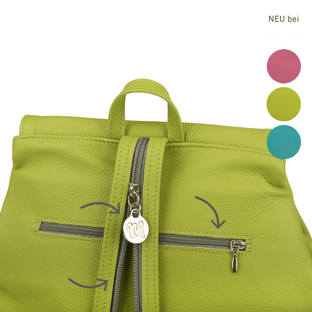 Der Reißverschluss eines Rucksacks aus Leder in der Farbe apfelgrün.