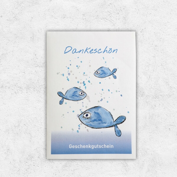 Eine Gutscheinkarte, bedruckt mit Fischen und der Aufschrift Dankeschön.