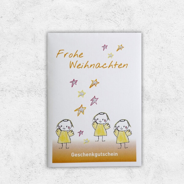 Eine Gutscheinkarte, bedruckt mit Engeln und der Aufschrift Frohe Weihnachten.